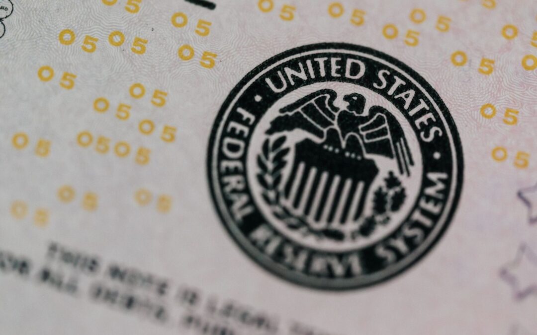 From above eagle on antique column in circle on banknote of Unites States placed on table
